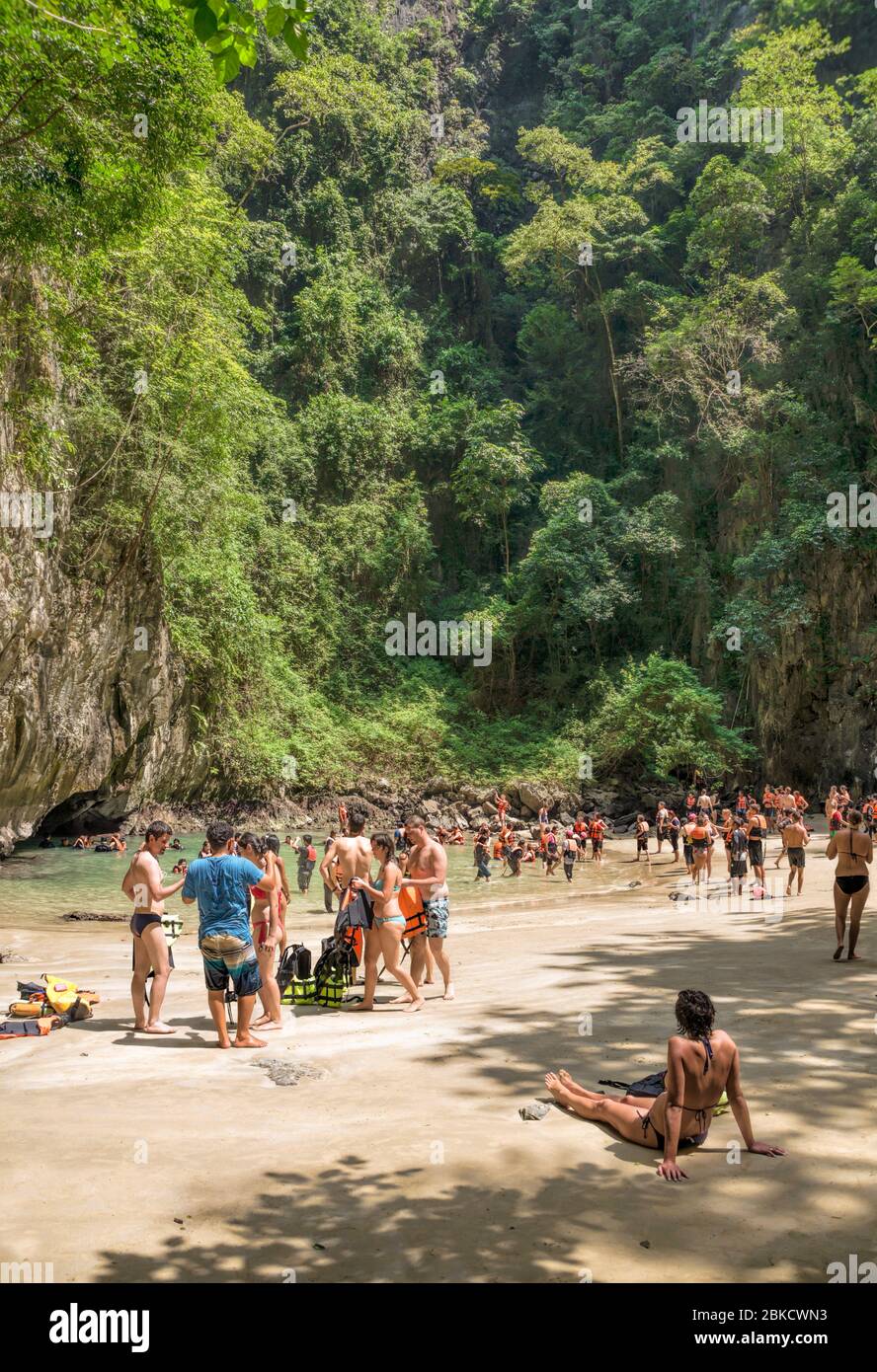 Mass tourism of Asian Tourist Groups at Emerald Cave (Tham Morakot), Thailand Stock Photo