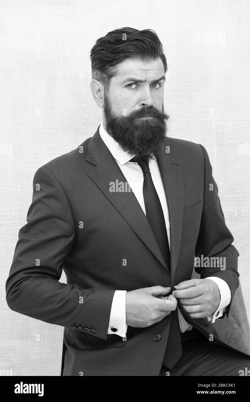 Formal and stylish. Stylish businessman button suit jacket. Bearded man in office  style. Professional capsule wardrobe. Stylish wear to work. Fashion and  style. Elegant and stylish. For added style Stock Photo -