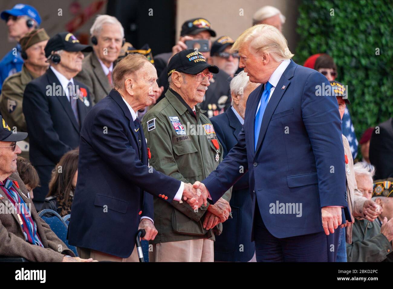 President Donald Trump (R) greets veterans who survived Pearl Harbor prior to signing a Pearl Harbor Remembrance Day Proclamation at the White House, December 7, 2017, in Washington, DC. Pearl Harbor was