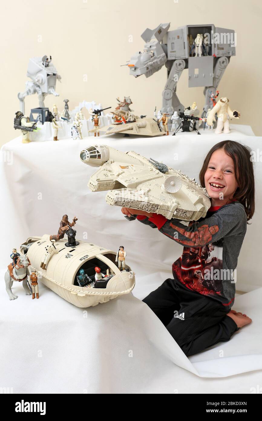 May the 4th be with you. Star wars day 2020, Crckhowell, Wales. 7 year old Rhys Williams enjoys Star Wars day playing with gis vintage Star Wars toys Stock Photo