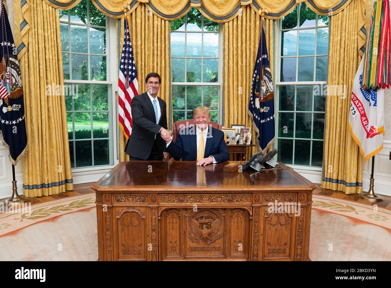 President Donald J. Trump welcomes newly named acting Secretary of Defense Mark Esper Wednesday, June 19, 2019,  in the Oval Office of the White House. President Trump and Acting Secretary of Defense Mark Esper Stock Photo