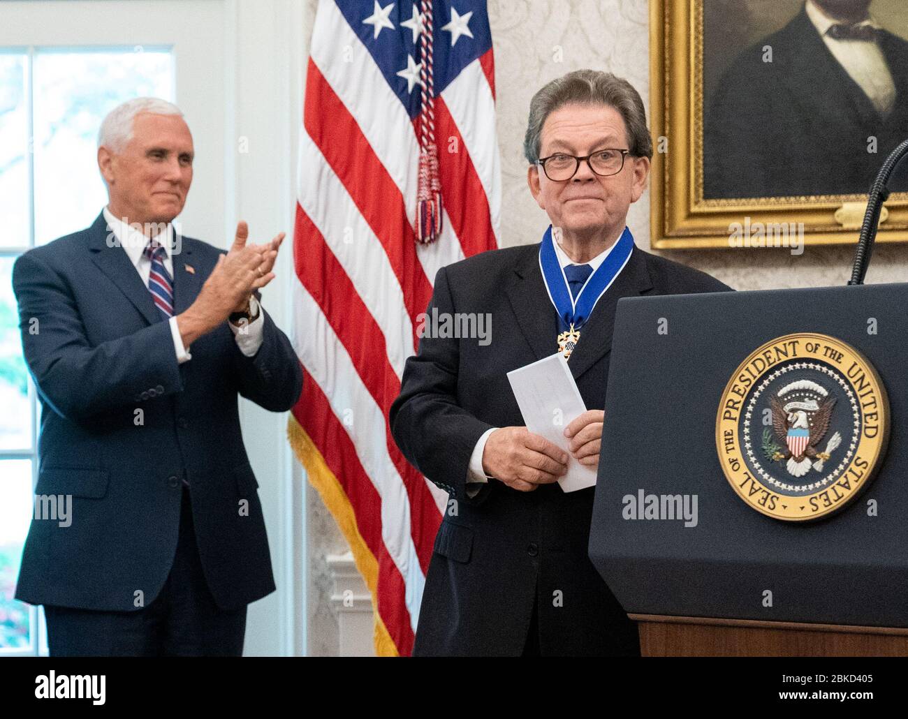 Presidential Medal of Freedom recipient  economist Arthur B. Laffer is applauded Wednesday, June 19, 2019, by Vice President Mike Pence in the Oval Office of the White House. President Trump Presents the Medal of Freedom Stock Photo