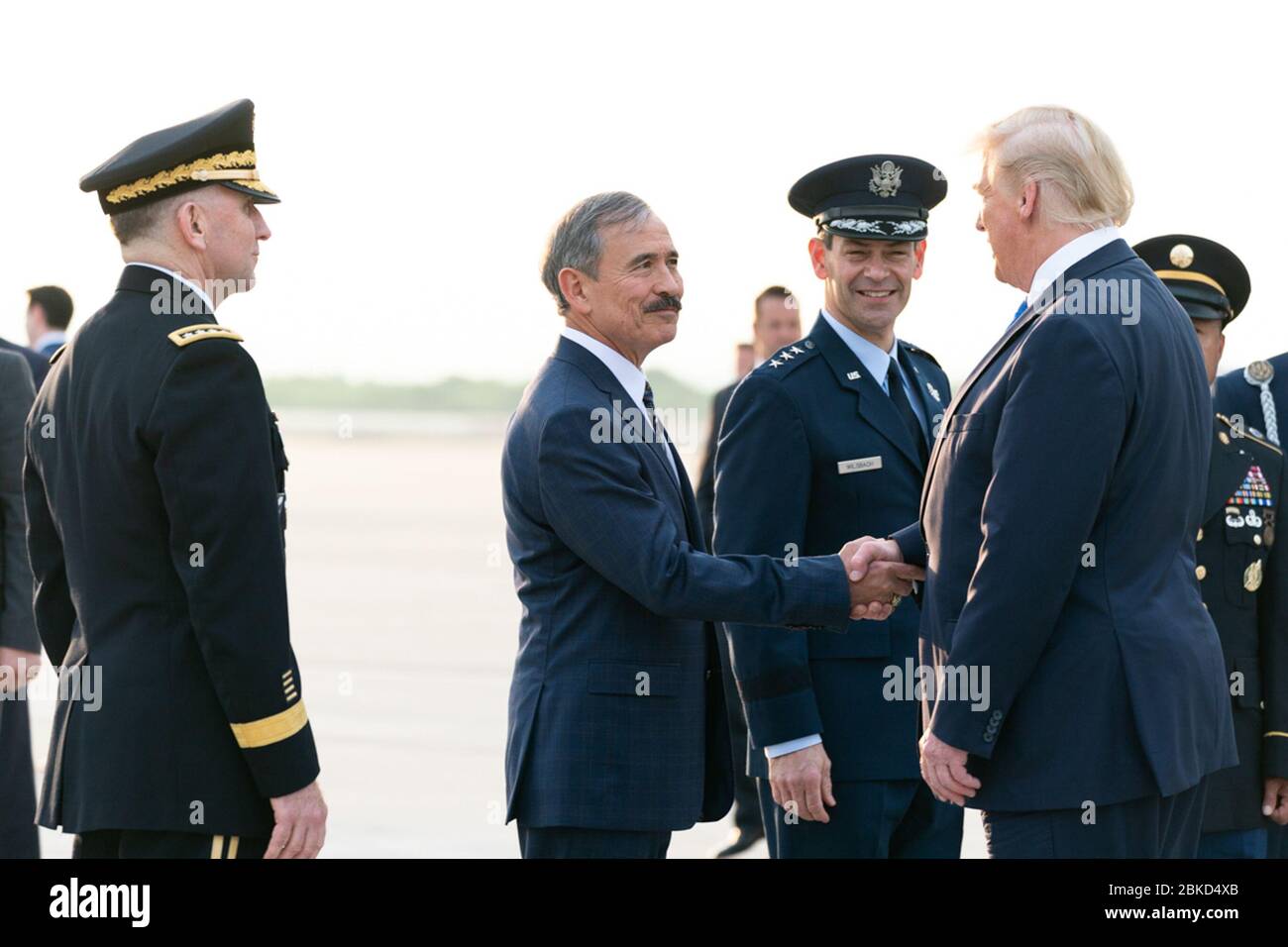 President Donald J. Trump shakes hands with U.S. Ambassador to the Republic of South Korea Harry B. Harris Jr., as he is welcomed upon arrival Saturday, June 29, 2019, to Osan Air Base in Seoul, Republic of Korea. President Trump in Seoul Stock Photo