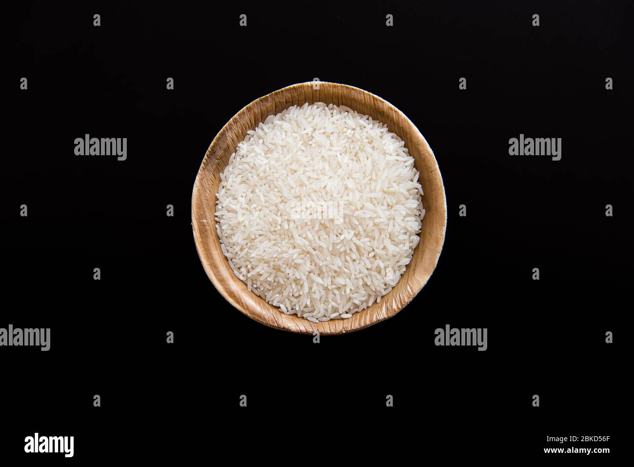 Basmati rice /Long grain white rice on black background Stock Photo