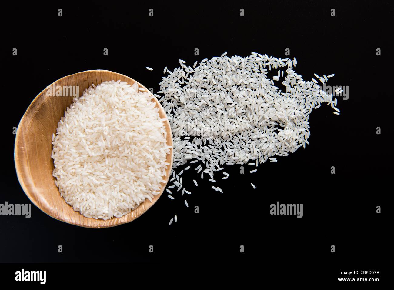 Basmati rice /Long grain white rice on black background Stock Photo