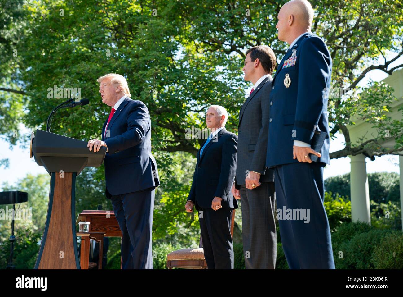 President Donald J. Trump, joined by Vice President Mike Pence, Secretary of Defense Mark Esper and General John ”Jay” Raymond Commander of USSPACECOM, delivers remarks at the Establishment of the U.S. Space Command (USSPACECOM) Thursday, Aug. 29, 2019, in the Rose Garden of the White House. The Establishment of the U.S. Space Command Stock Photo