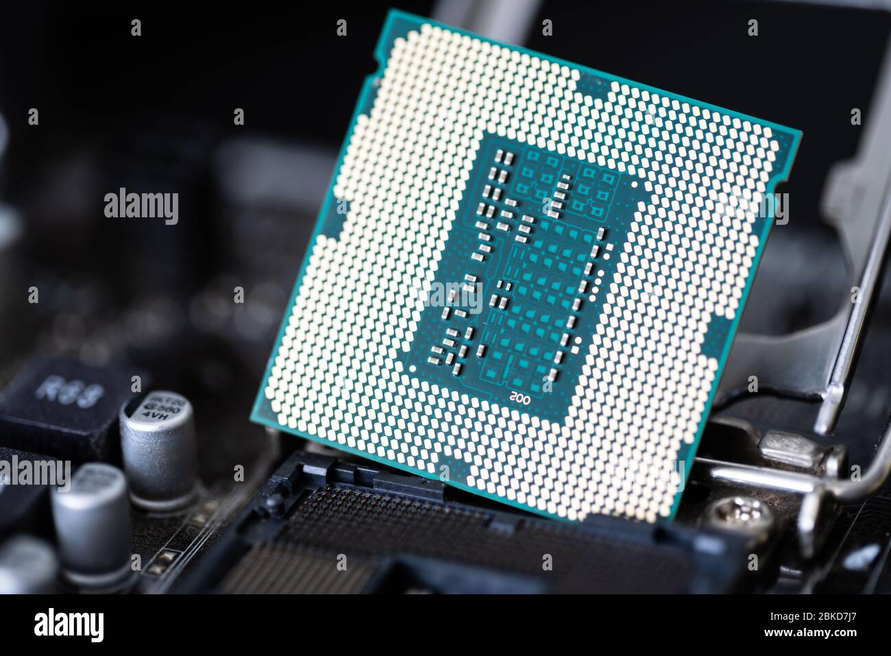 The processor is a small chip that resides in computers and other electronic devices Stock Photo