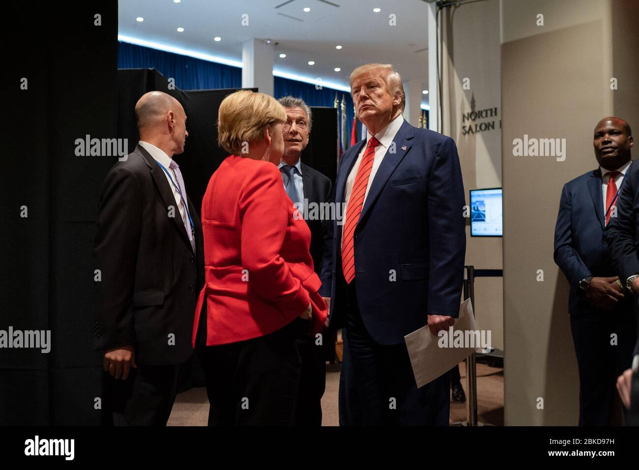 President Donald J. Trump meets informally with German Chancellor Angela Merkel  and Argentine President Mauricio Macri Tuesday, September 24, 2019, as he prepares to leave the United Nations Headquarters in New York City. #UNGA Stock Photo