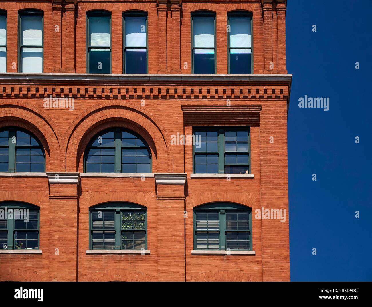 Sixth Floor window (open) on Texas School Book Depository Building in Dallas, Texas from where Lee Harvey Oswald shot and killed US President John F K Stock Photo