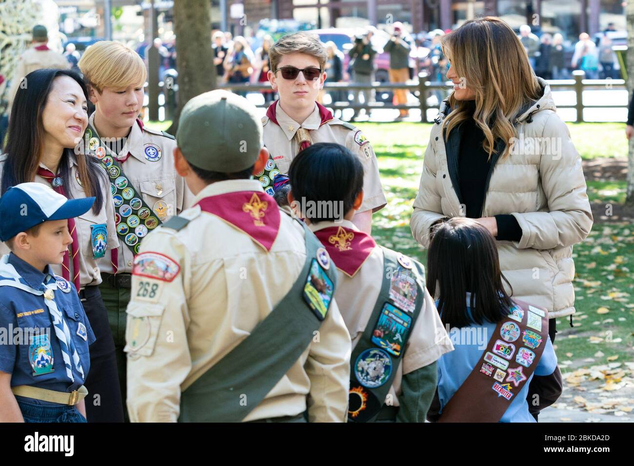 First Lady Melania Trump talks with Jackson, Wyoming’s first woman Scoutmaster Mindy Kim-Miller and members of the Boy Scouts and the Girl Scouts at the Antler Arch Thursday, Oct. 3, 2019, at Jackson Hole Town Square in Jackson, Wyo. First Lady Melania Trump's Visit to Wyoming Stock Photo
