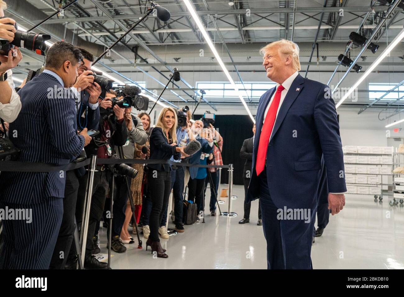 U.S President Donald Trump tours the newly opened Louis Vuitton Workshop  Rochambeau October 17, 2019 in Alvarado, Texas. Joining the president from  left to right are: Carlos Sousa, the general manager of