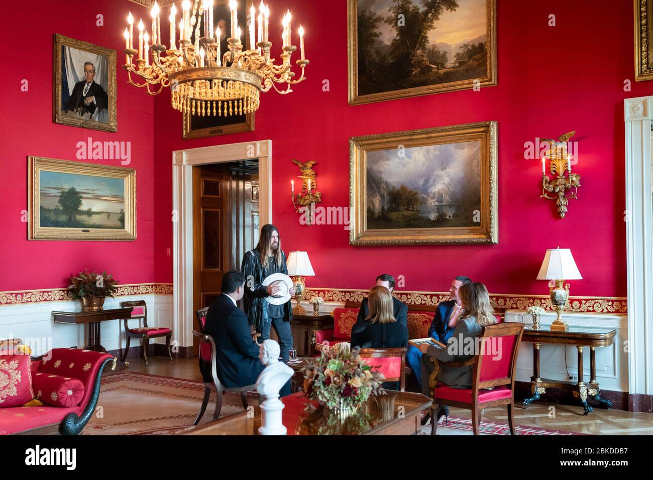 Musician Billy Ray Cyrus, joined by David and Joshua Smith, speaks to First Lady Melania Trump about cyber bullying and the death of 16 year-old Channing Smith Monday, Nov. 18, 2019, in the Red Room of the White House. Channing died by suicide in September after a cyber bullying incident. First Lady Melania Trump Meets with Billy Ray Cyrus and the Smith Family Stock Photo