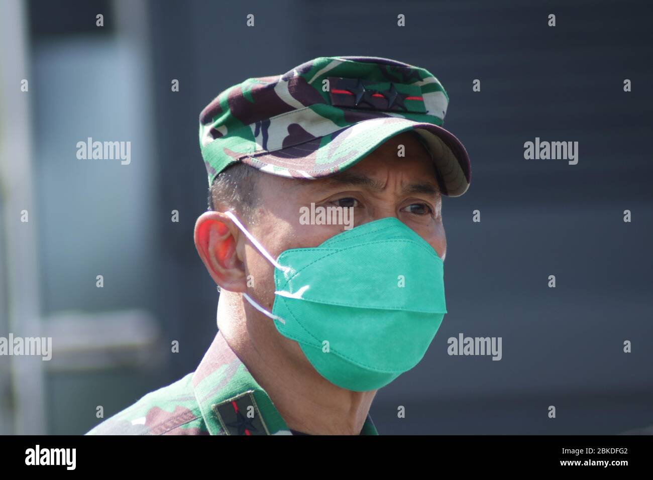 Indonesian National Army personnel wear masks when carrying out their