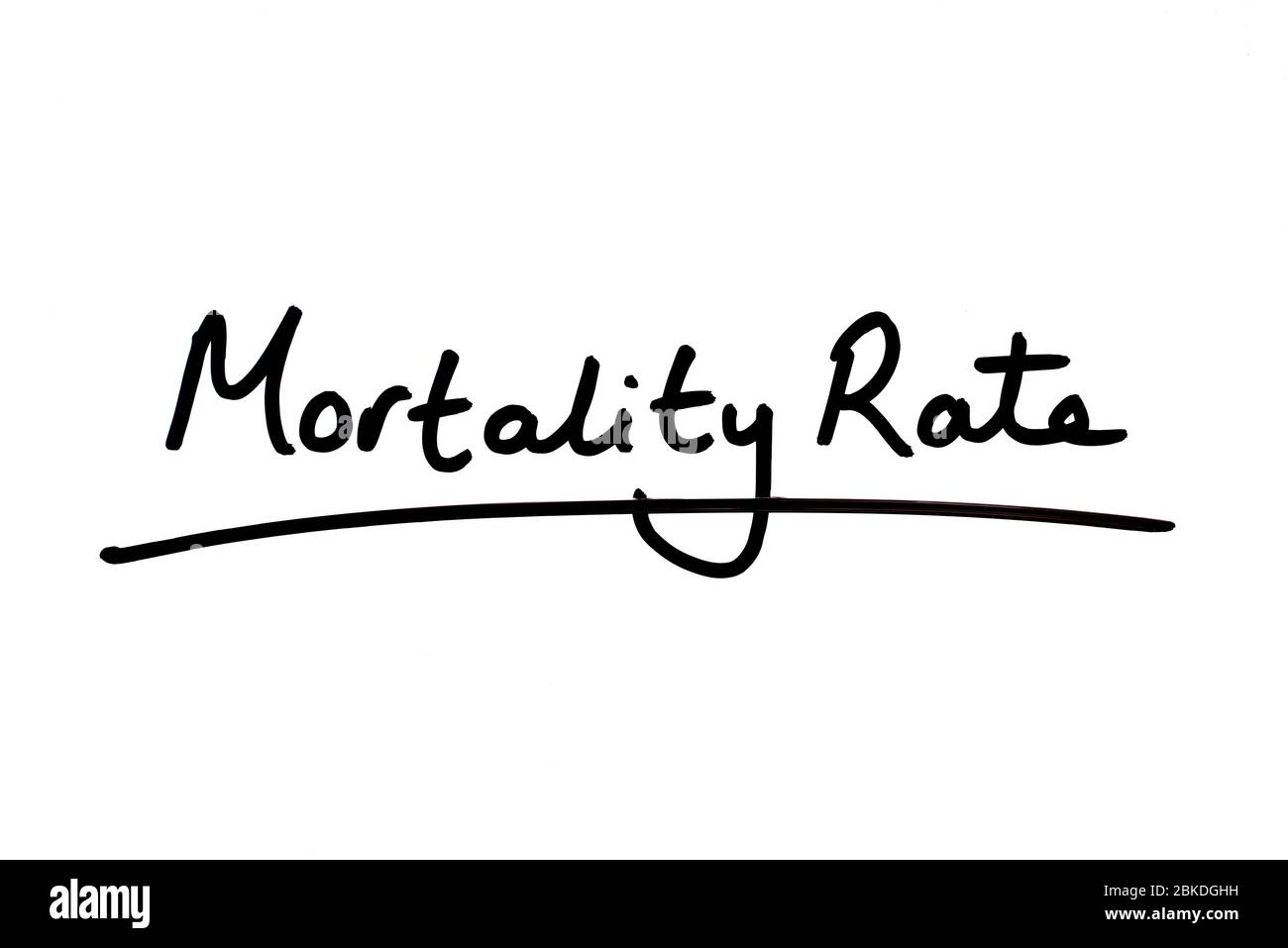 Mortality Rate handwritten on a white background. Stock Photo
