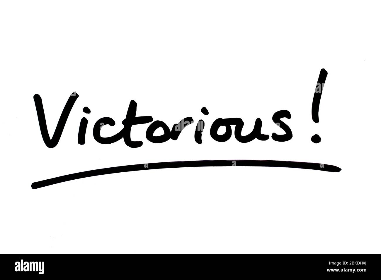 Victorious! handwritten on a white background. Stock Photo