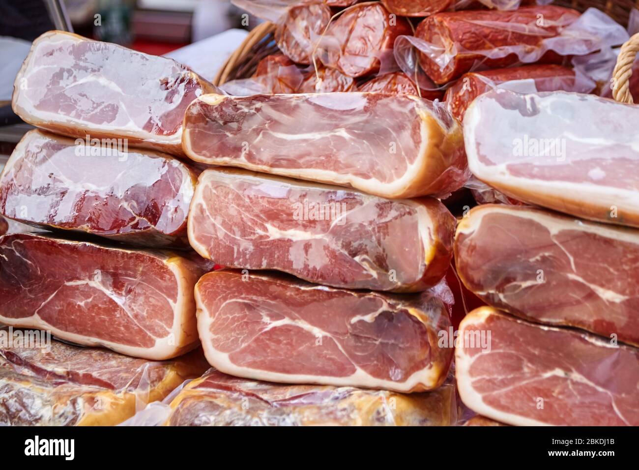 Ham. Vacuumpacked meat products on the counter of the farmers market