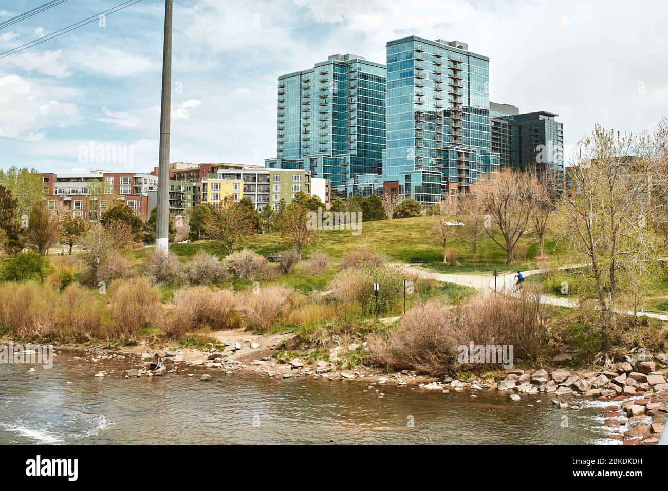 Landscape view of Commons Park with apartments and office buildings in the  distance in lower Downtown Denver, Colorado Stock Photo - Alamy