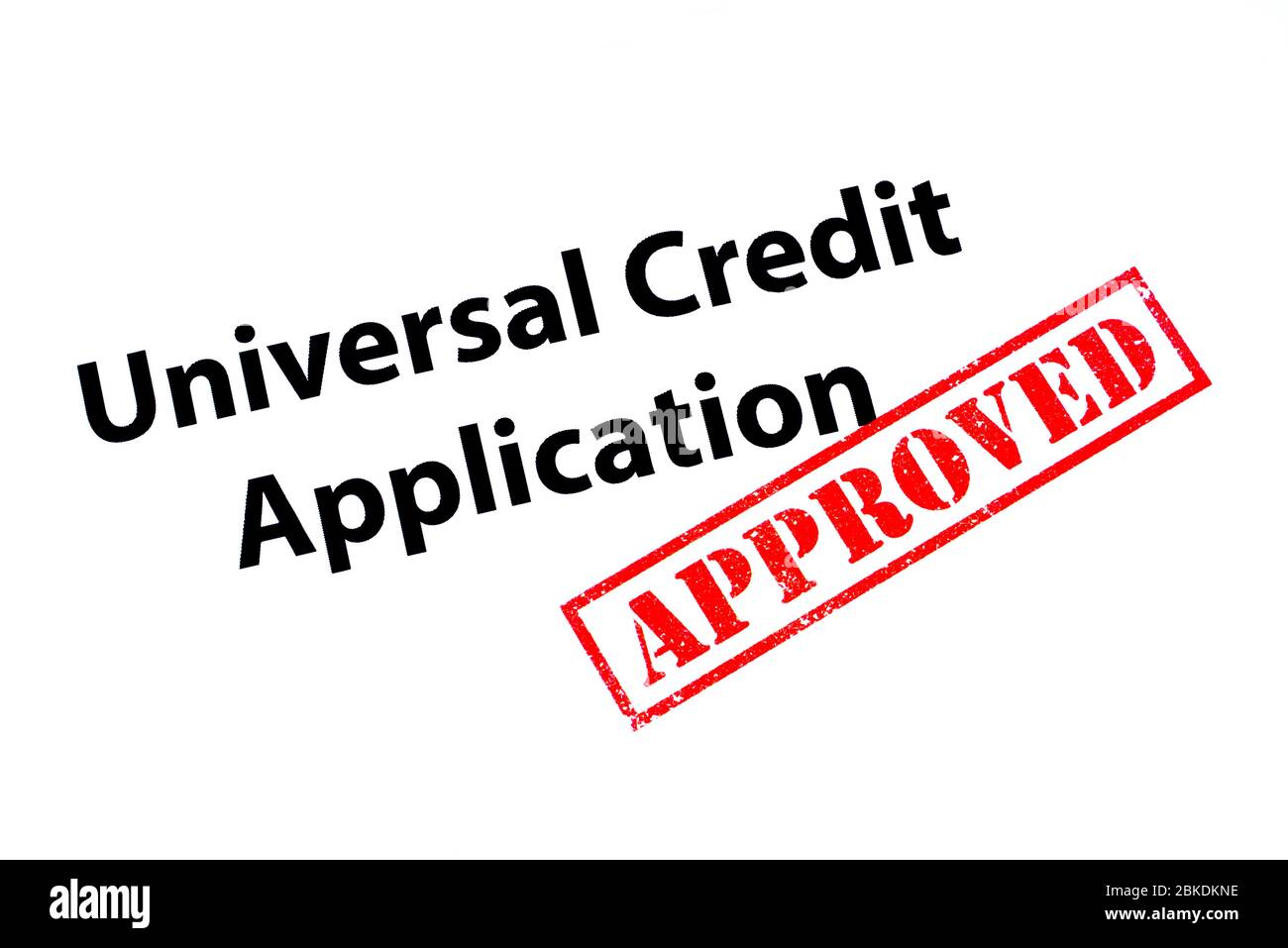 Universal Credit Application heading with a red APPROVED rubber stamp. Stock Photo