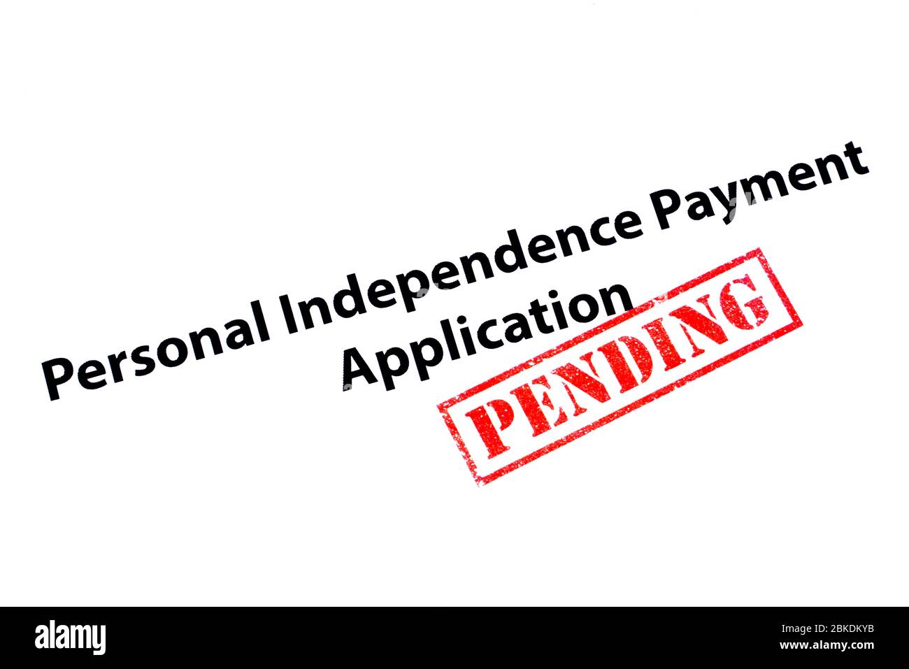 Personal Independence Payment Application heading with a red PENDING rubber stamp. Stock Photo