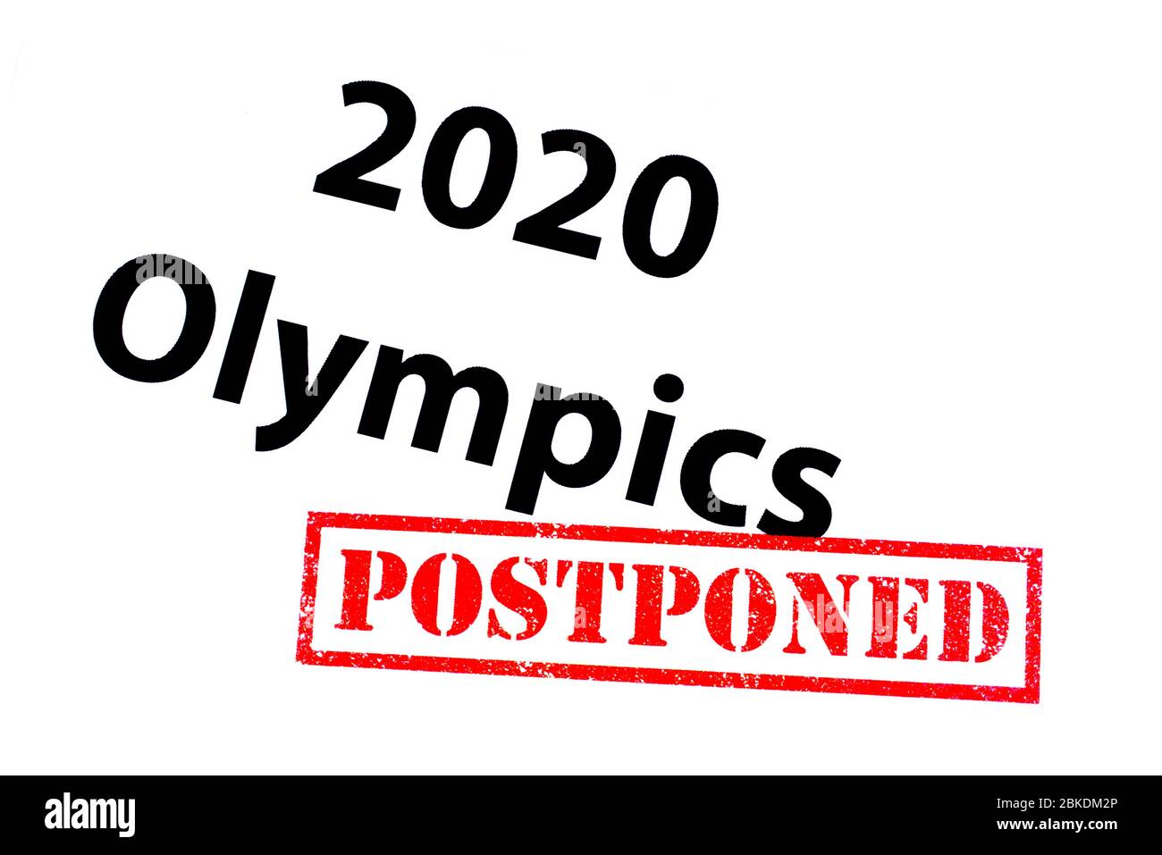 2020 Olympics heading with a red POSTPONED rubber stamp. Stock Photo