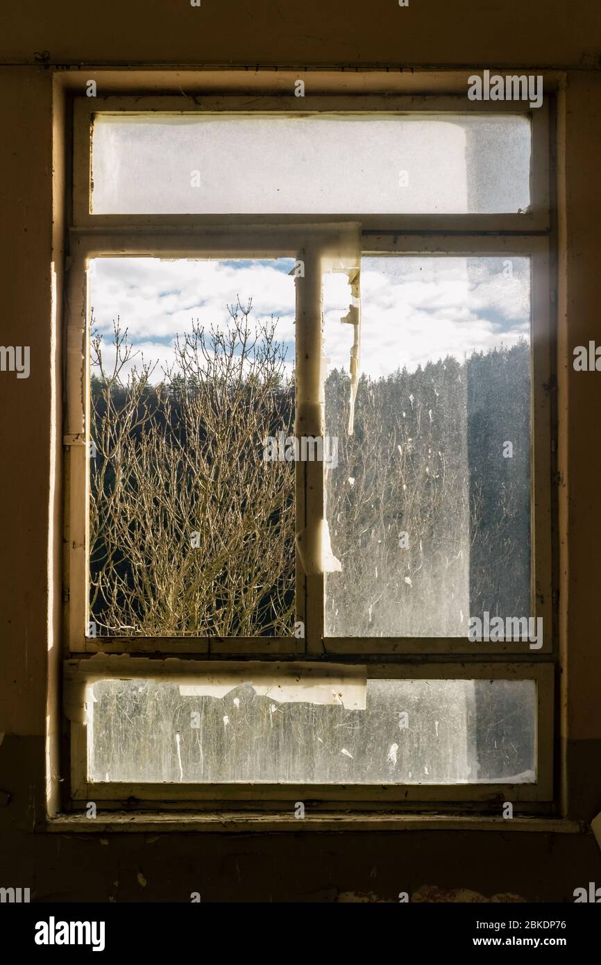 View from an old window of an abandoned house. Stock Photo
