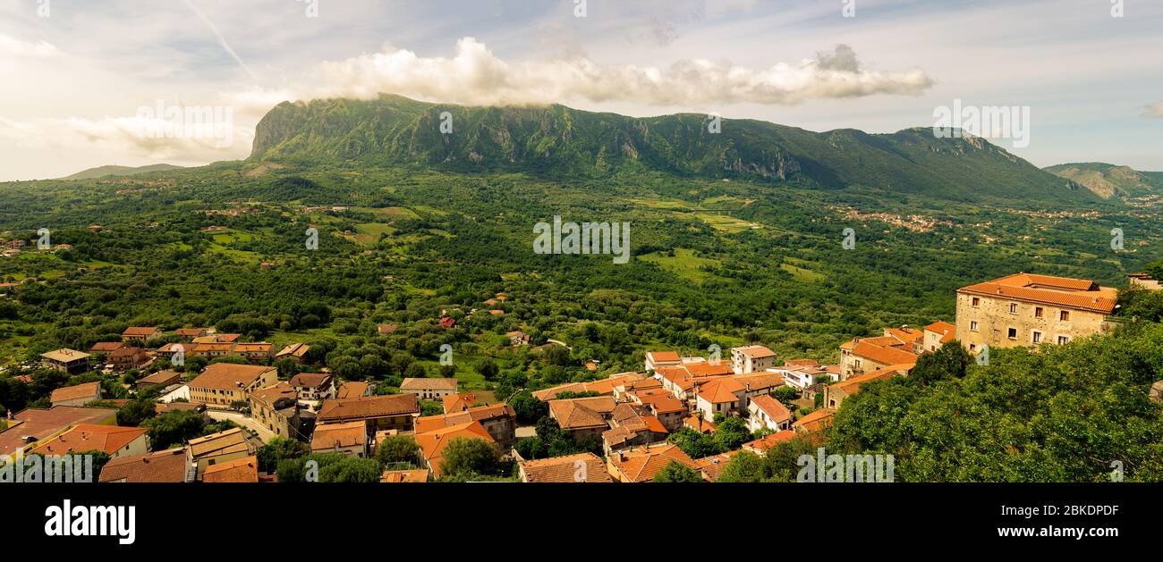 The mountain range of Monte Bulgheria and a village in the province of Salerno in the Campania region of south-western Italy. Cilento National Park. Stock Photo