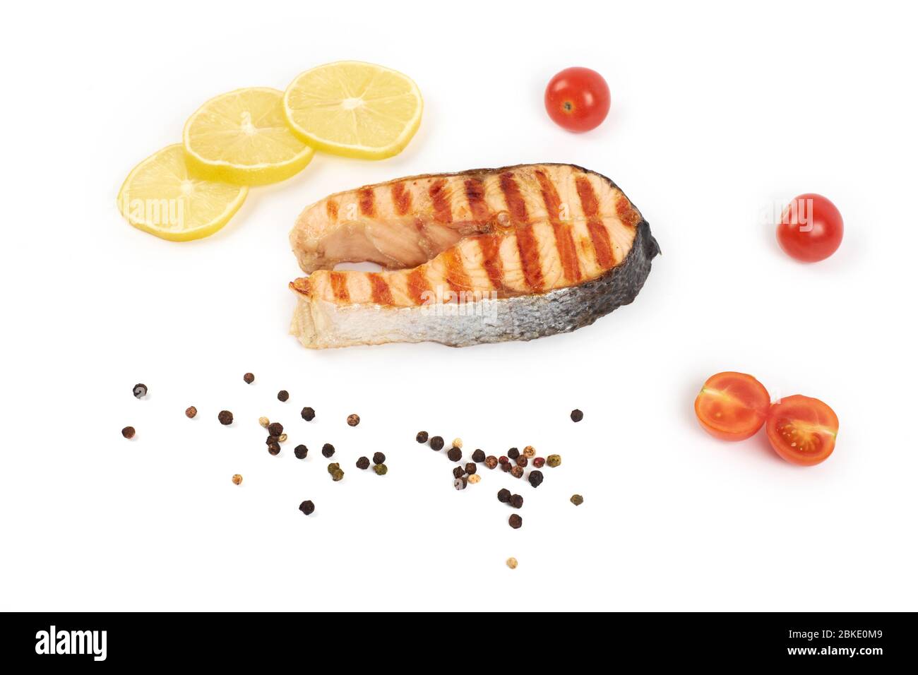 Grilled salmon steak isolated on white background Stock Photo - Alamy