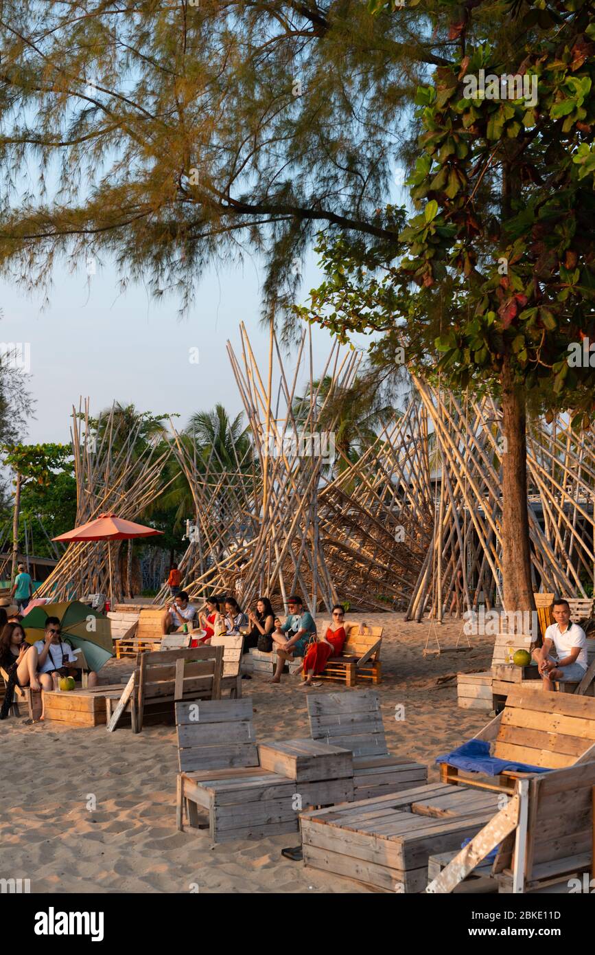 People enjoying sunset in Sunset Sanato Beach Club, Phu Quoc Stock Photo