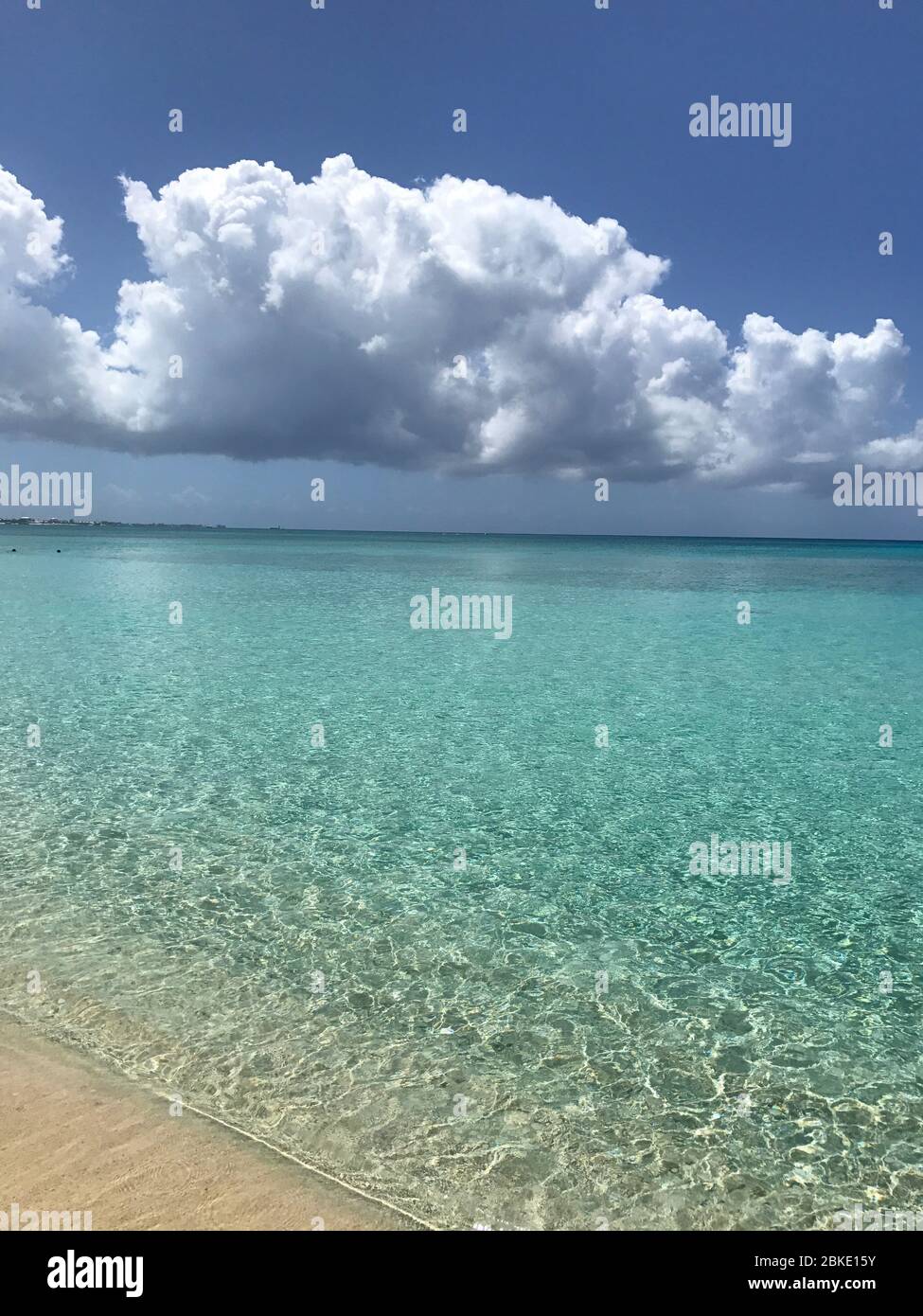 Clear blue Caribbean Sea view from Seven Mile Beach in Grand Cayman, Cayman Islands. Stock Photo