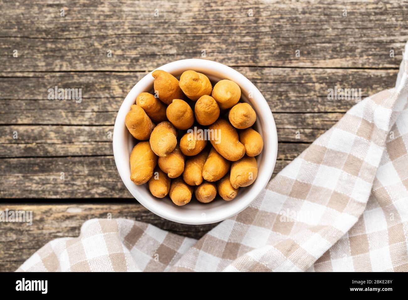 Mini bread sticks in bowl. Top view. Stock Photo