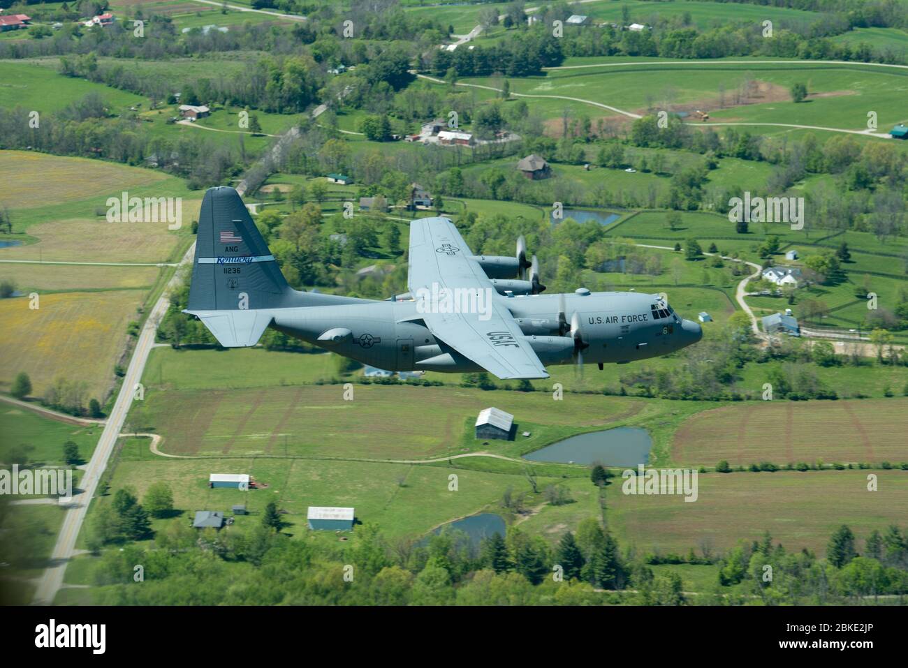 A Kentucky Air National Guard C-130 Hercules flies over the commonwealth of Kentucky as part of Operation American Resolve on Friday, May 1, 2020.  The 123rd Airlift Wing sent two C-130s for the aerial demonstration that is a nationwide salute to all those supporting COVID-19 response efforts. The flyover is intended to lift morale during a time of severe health and economic impacts that have resulted from COVID-19. (U.S. Air National Guard photo by Phil Speck) Stock Photo