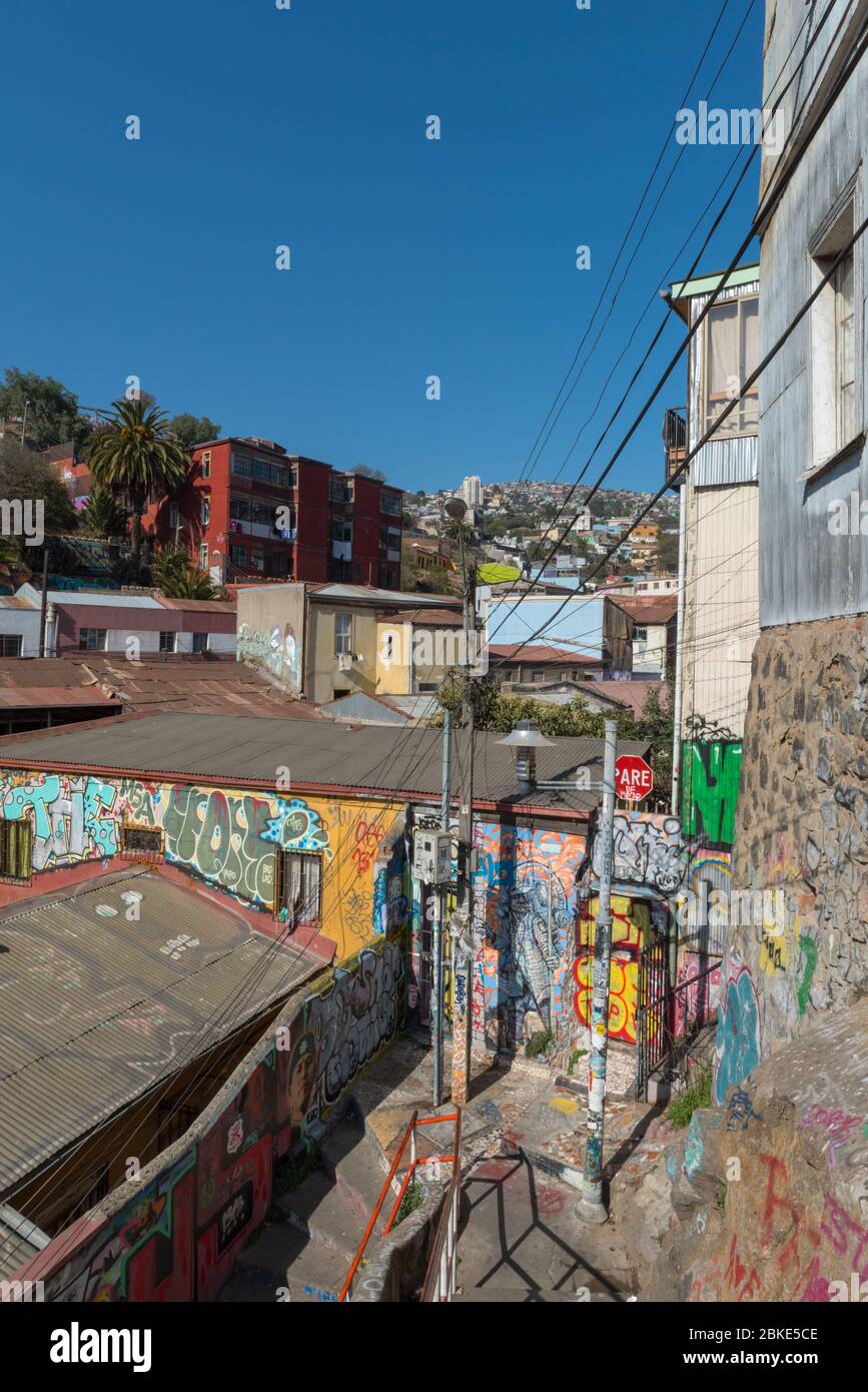 Colored graffiti, street art on the walls of Valparaiso, Chile Stock Photo