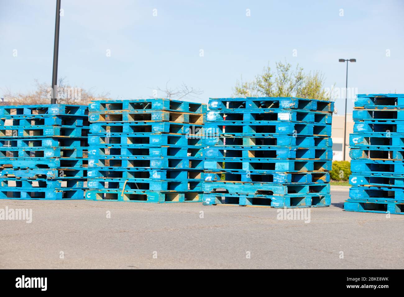 Blue industrial pallets hires stock photography and images Alamy