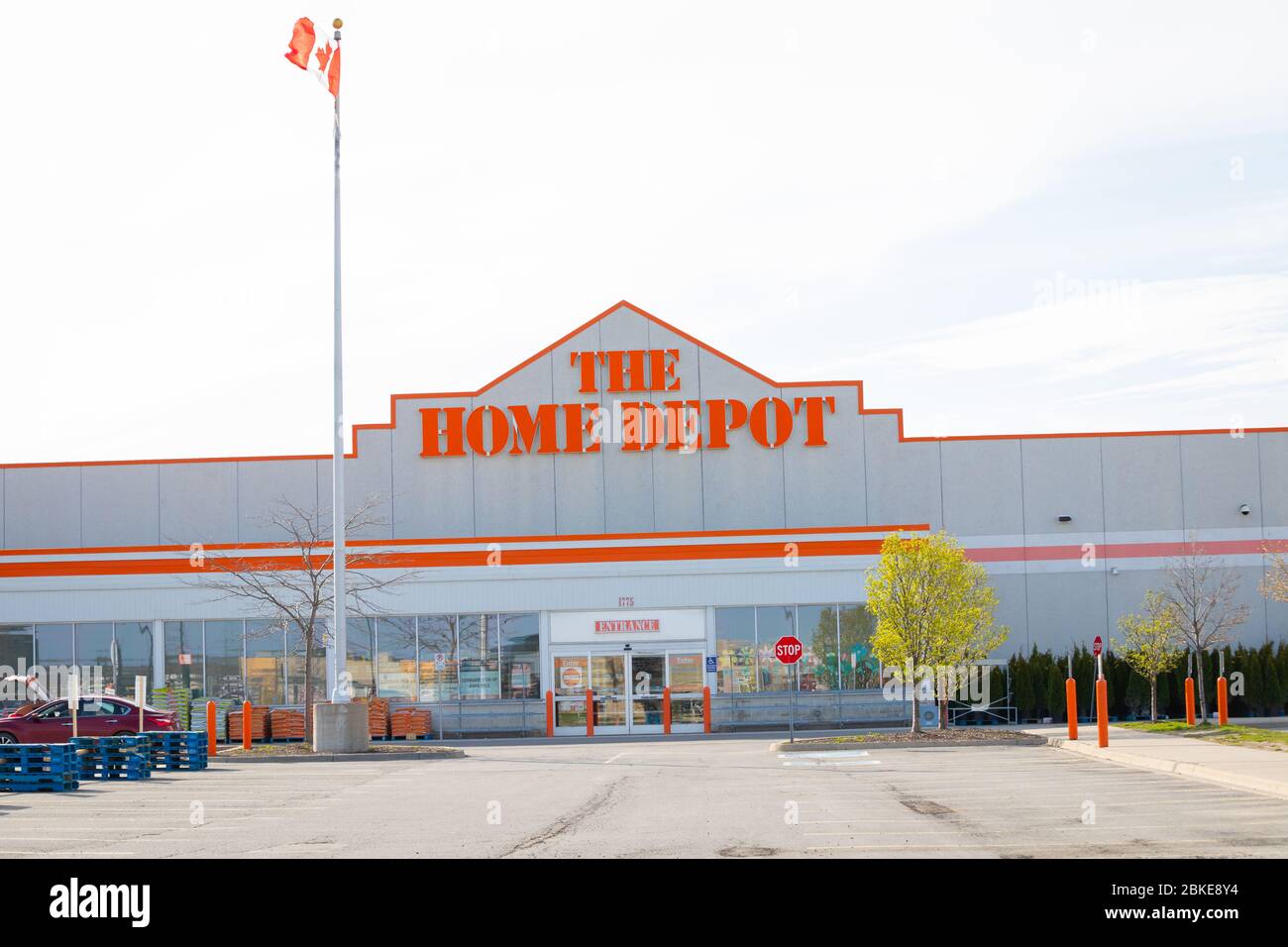 The Home Depot storefront seen with  the empty parking lot due to covid19 pandemic most business are closed. Stock Photo