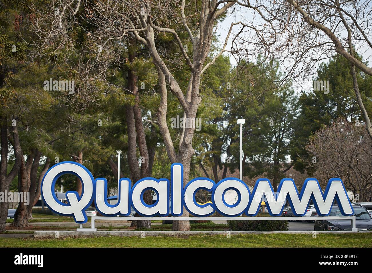 The Qualcomm sign is seen at the American multinational semiconductor and telecommunications equipment company Qualcomm Inc.'s Silicon Valley campus. Stock Photo