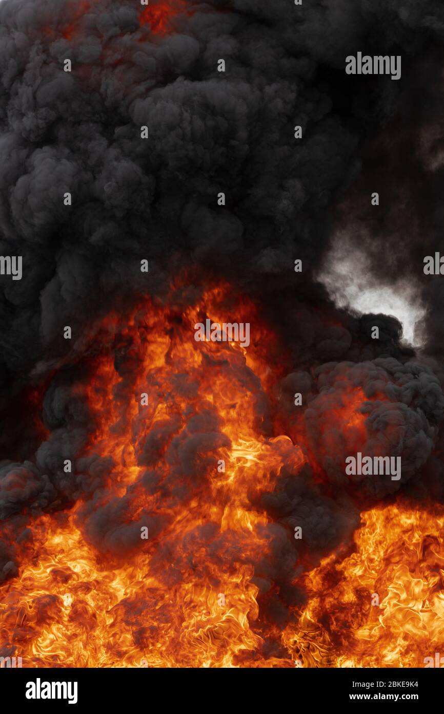 Flames of strong red fire and motion blur black clouds smoke covered ...