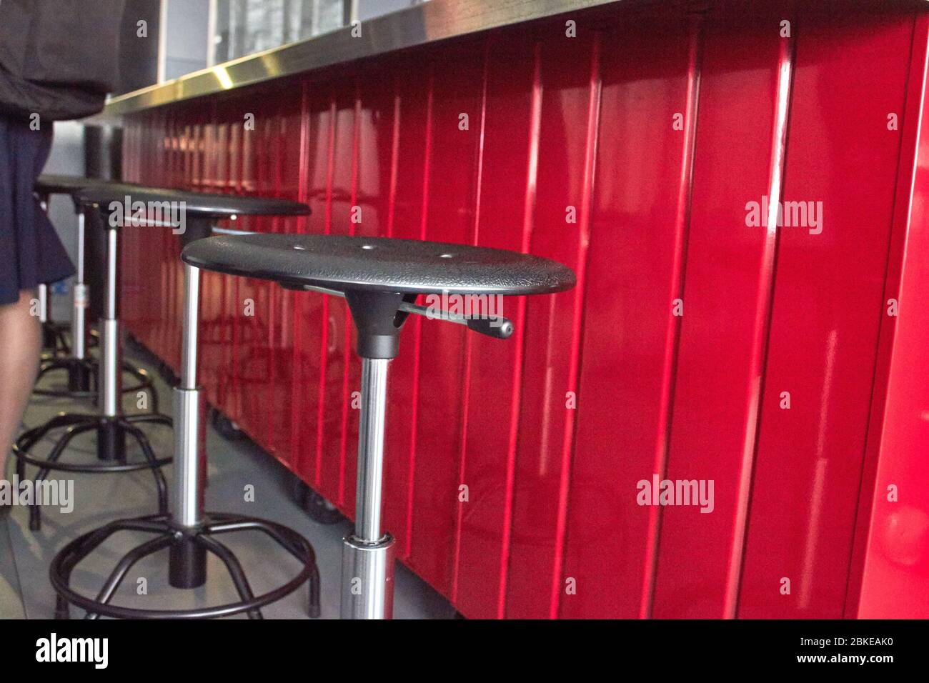 Bar chairs made from industrial tools and material Stock Photo