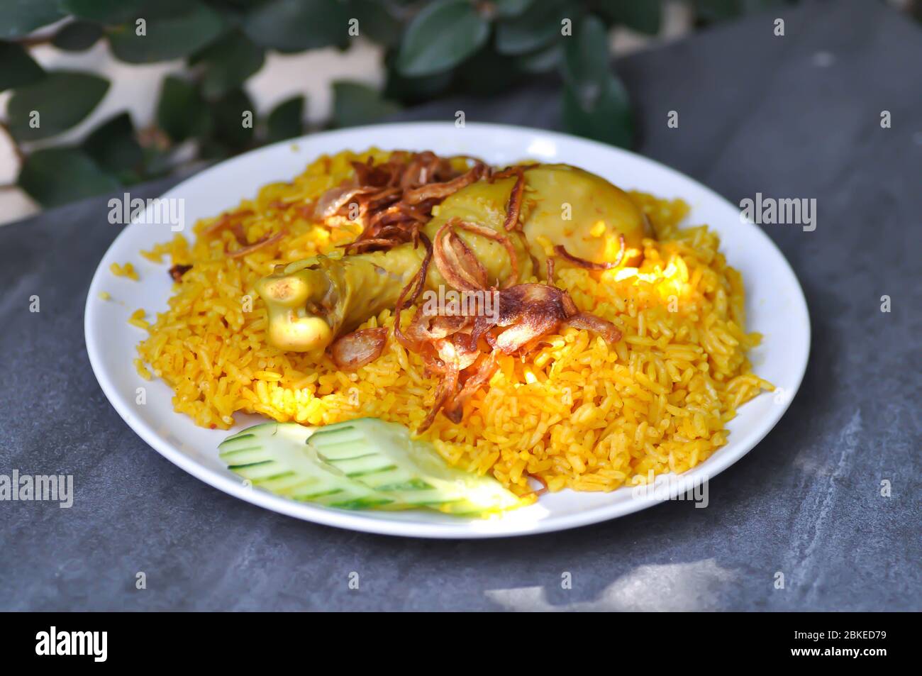 chicken rice or spiced rice steamed with chicken, rice cooked with