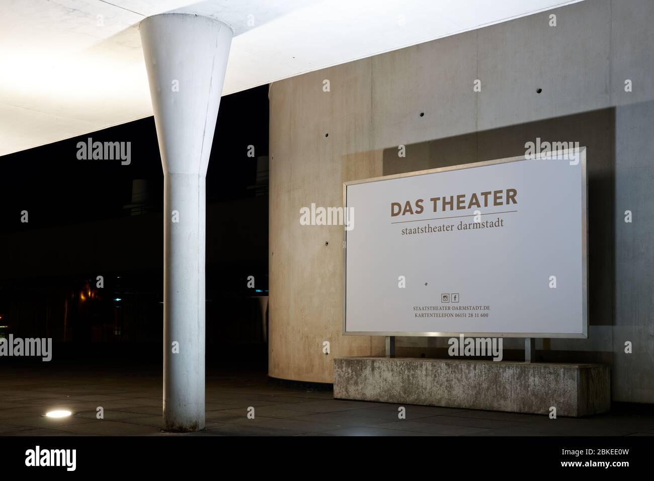 Darmstadt, Germany, Apr 17 2020: Sign at the entrance to the Darmstadt theatre, das Staatstheater, at night Stock Photo