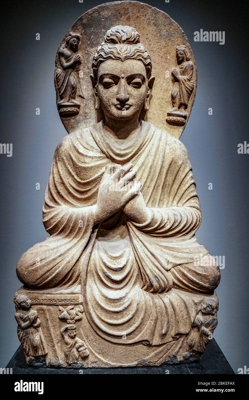 Seated Buddha, Gandhara, Kushan dynasty, 2nd - 3rd century Stock Photo