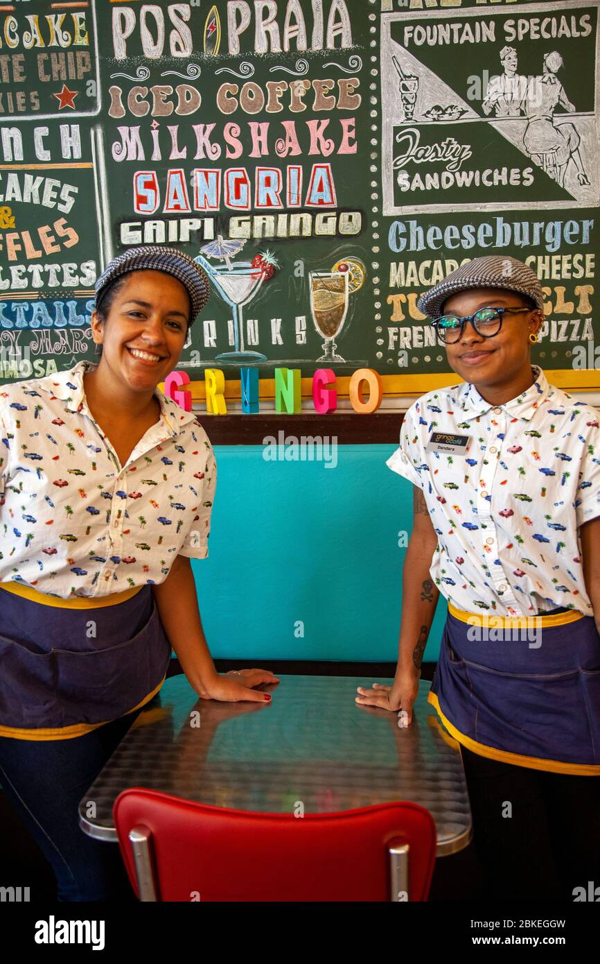 Two Staff members from Gringo Cafe in Ipanema, Rio de Janeiro - Brazil Stock Photo