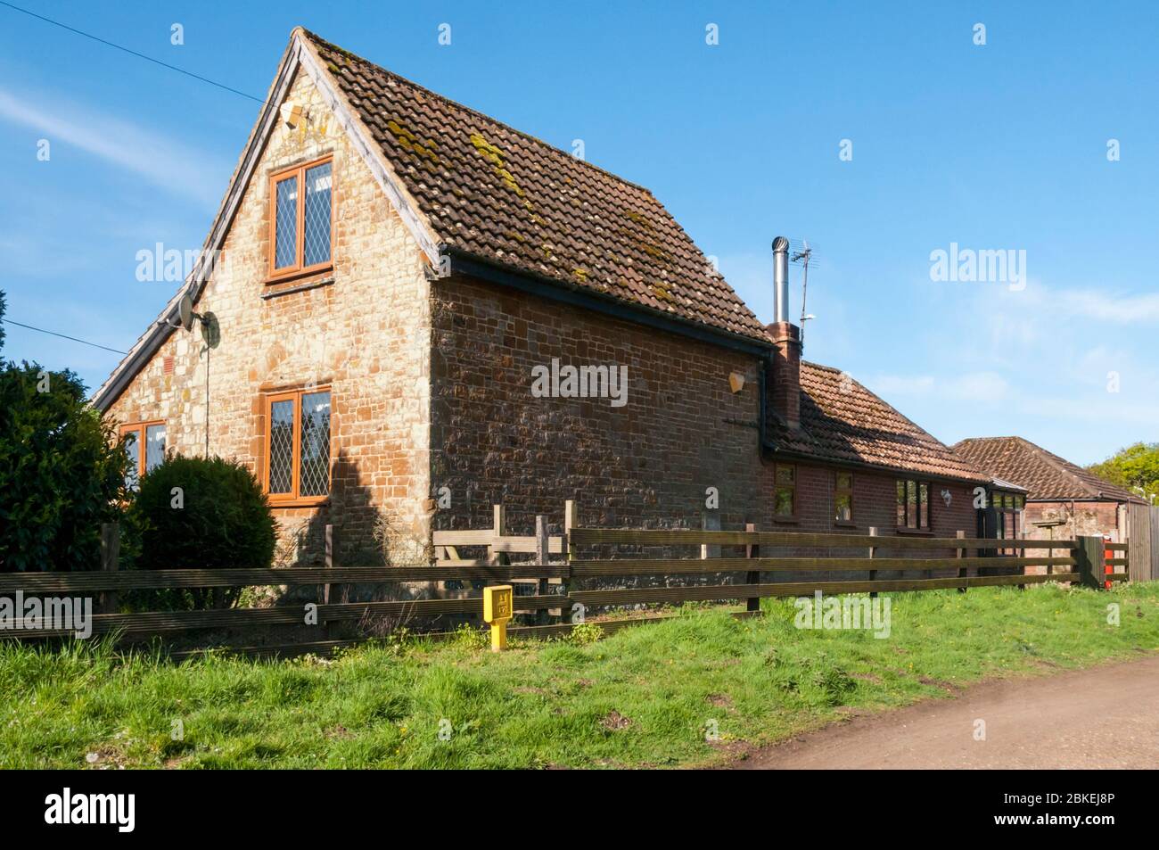 Old level crossing keeper's cottage in Snettisham, Norfolk. Once on Lynn-Hunstanton line. After the Beeching cuts of the 1960s,  now a private house. Stock Photo