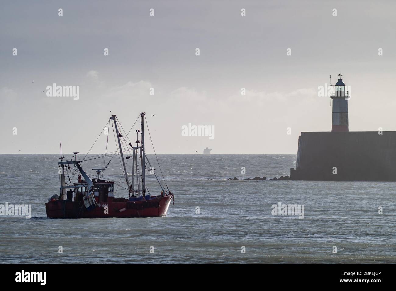 Small fishing boat in Newhaven Harbour Stock Photo