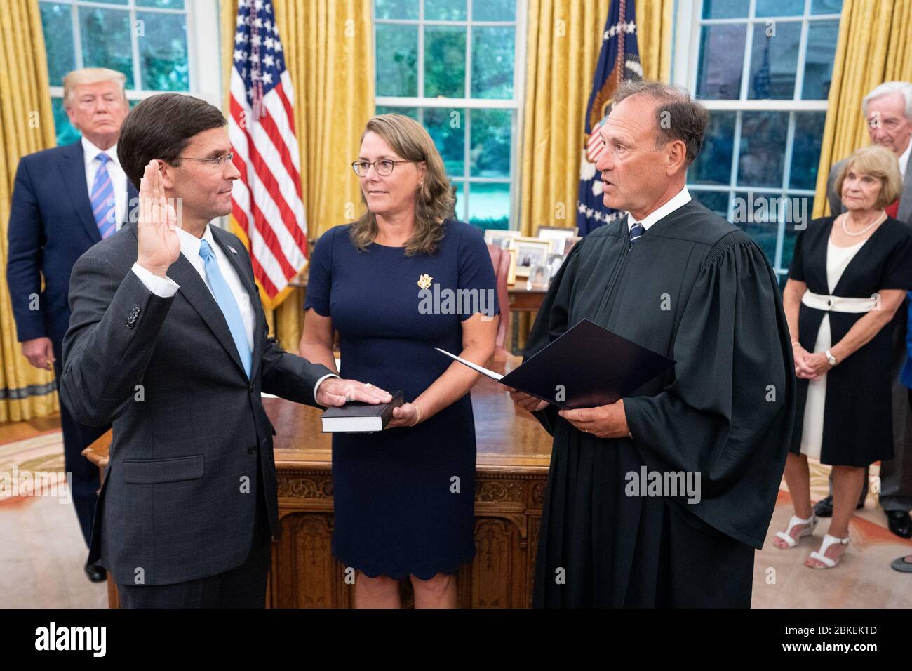 President Donald J. Trump watches as U.S. Supreme Court Associate Justice Samuel Alito swears-in new Secretary of Defense Mark Esper Tuesday, July 23, 2019, in the Oval Office of the White House. Swearing-in Ceremony for Secretary of Defense Mark Esper Stock Photo