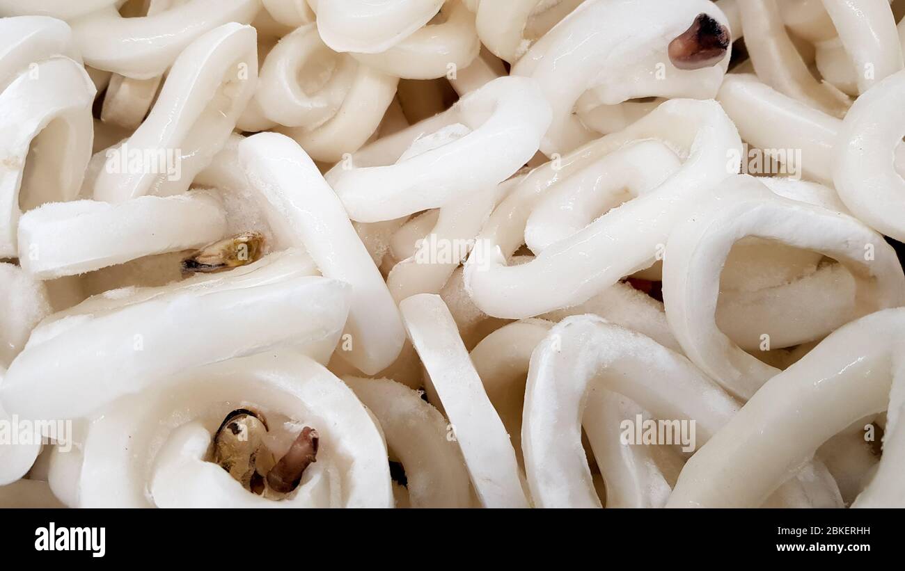 Sales of fresh squid in the market. Frozen seafood Stock Photo - Alamy