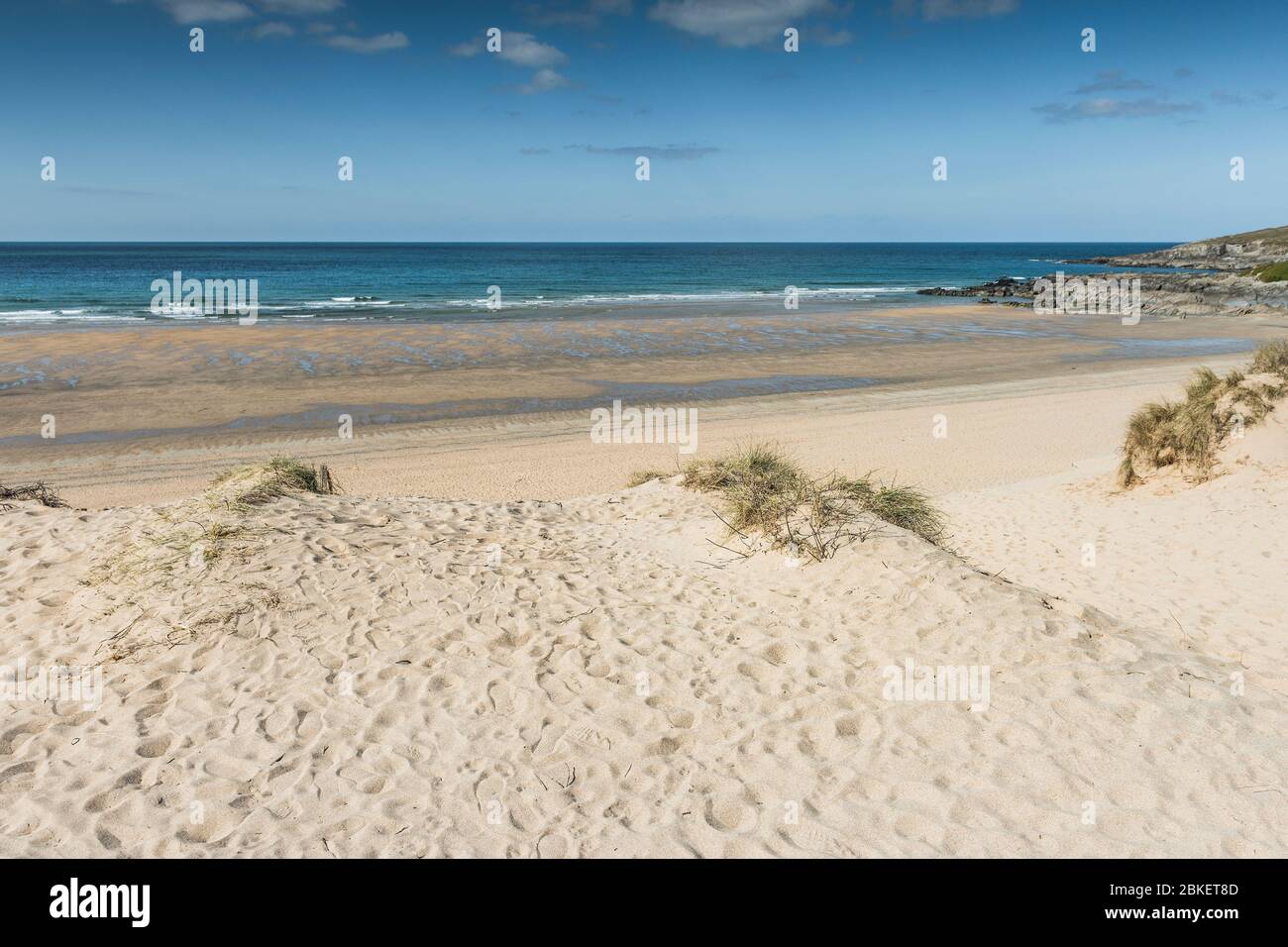 Due to the Coronavirus Covid-19 lock down a normally busy Fistral Beach is totally deserted in Newquay in Cornwall. Stock Photo