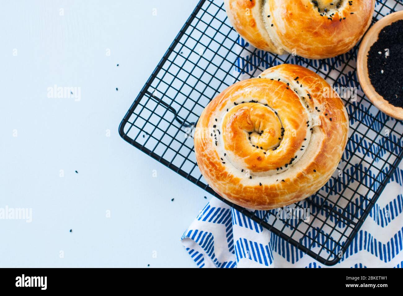 Freshly baked pie with spinach and cheese from flaky dough Stock Photo