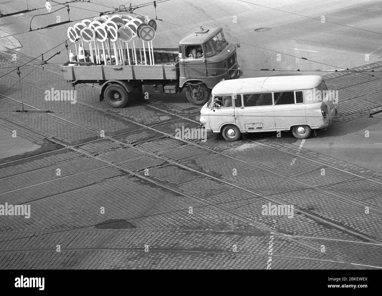 20 June 1980, GDR, Leipzig: At the Karl-Marx-Platz intersection in Leipzig in the early 1980s, a W50 truck with traffic signs and a Barkas B1000 van meet. Photo: Volkmar Heinz/dpa-Zentralbild/ZB Stock Photo