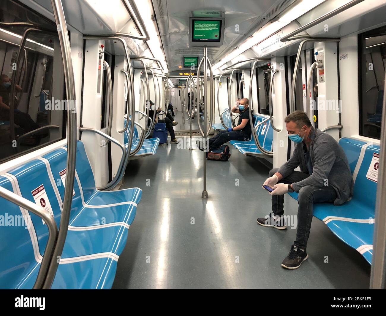 Rom, Italy. 04th May, 2020. Only a few passengers sit in a subway on the 'B' line. After almost two long months, Italy has relaxed the curfews, which were among the strictest in Europe. Credit: Alvise Armellini/dpa/Alamy Live News Stock Photo