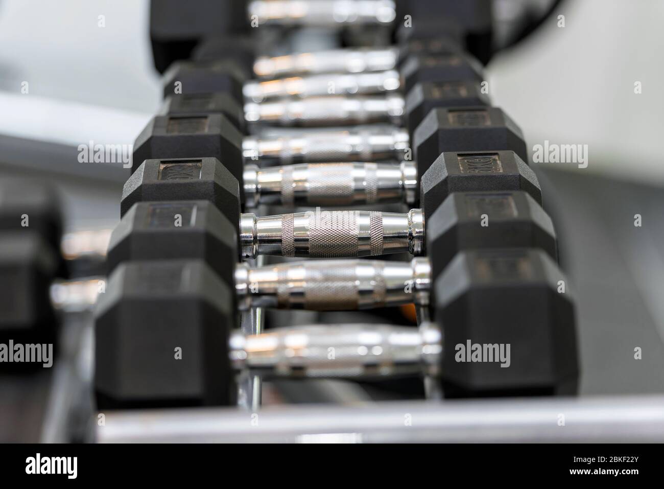 Many dumbbells on rack hi-res stock photography and images - Alamy